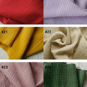May include: Six fabric swatches in a range of colours are displayed. The colours include red, lavender, mustard, cream, pink, and dark green. Each swatch is labelled with a number from #19 to #24.
