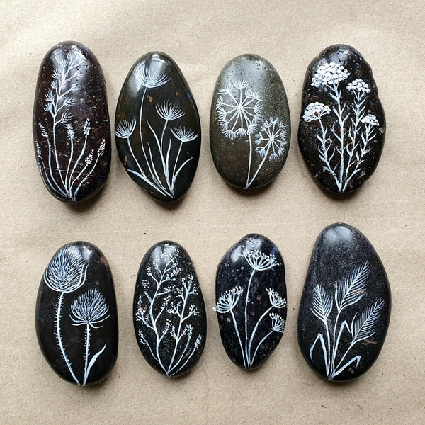 8 small hand-painted pebbles