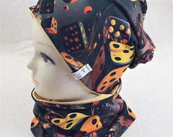 May include: A black and yellow beanie and neck warmer set with a dice pattern. The beanie has a fold-over cuff and the neck warmer is a tube style.