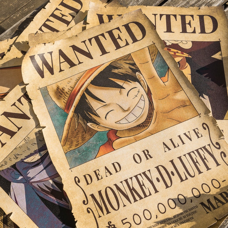 May include: A vintage-style wanted poster with a cartoon image of a man with a straw hat and a big smile. The poster says "DEAD OR ALIVE? MONKEY-D-LUFFY $500,000,000"