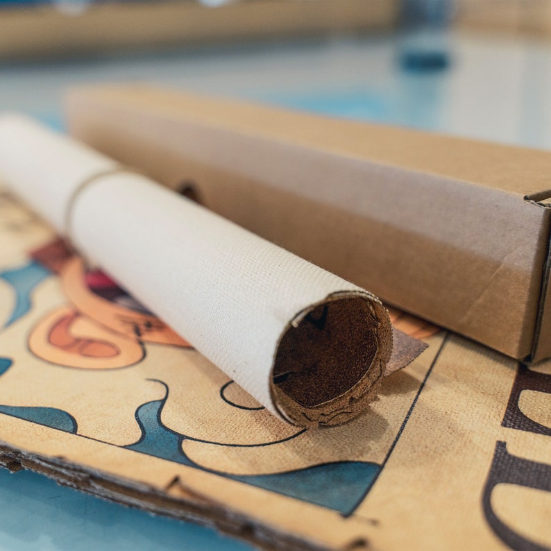 May include: A rolled up canvas print with a brown cardboard tube. The canvas print has a colorful design with a blue, yellow, and orange color scheme.