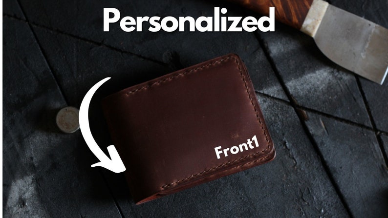 May include: A brown leather wallet with the text "Front1" embossed on the front.