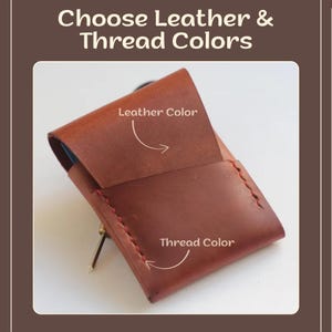 May include: A handmade leather wallet in shades of brown, with red stitching. The image includes the text "Choose Leather & Thread Colors" and arrows pointing to "Leather Color" and "Thread Color", indicating customization options.