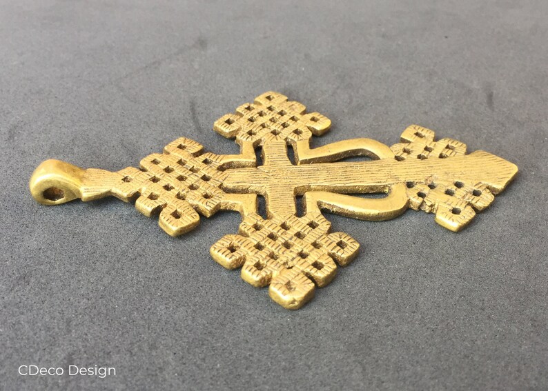 Ethiopian Coptic cross handmade in bronze with the lost wax technique.