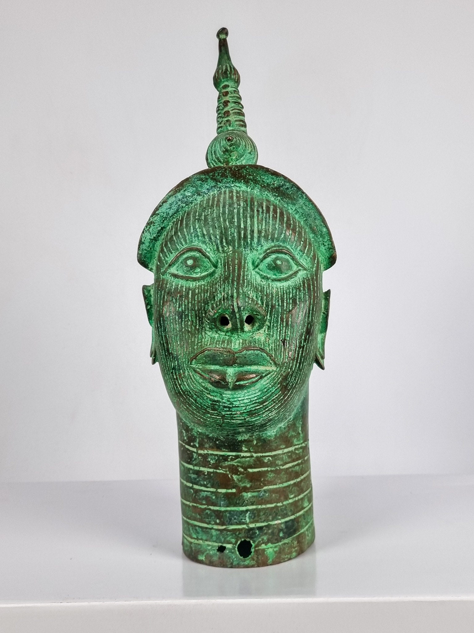 tête en bronze