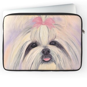 May include: A white Shih Tzu dog with a pink bow in its hair. The dog is looking directly at the camera with its tongue sticking out. The background is a soft, pastel purple and pink.