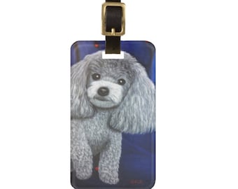 Miniature Poodle Luggage Tag. Unique Teacup Poodle lovers gift featuring a silvery grey toy poodle on a deep blue background.