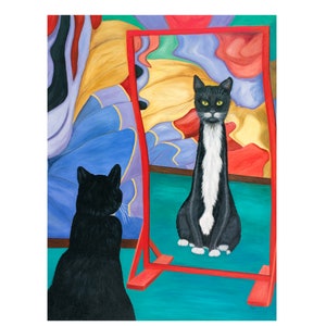 May include: A black and white cat looks into a red framed mirror, while another black cat watches from the side. The mirror reflects a colorful abstract background.