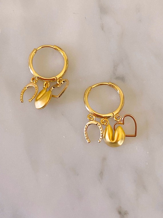 Lucky charm best sale earrings