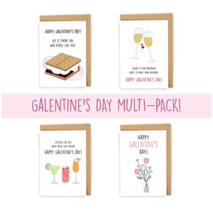 May include: Four greeting cards with different designs for Galentine's Day. The cards feature illustrations of a s'more, two glasses of champagne, cocktails, and a bouquet of flowers. The text on the cards reads "Happy Galentine's Day!" and includes various sayings about friendship.