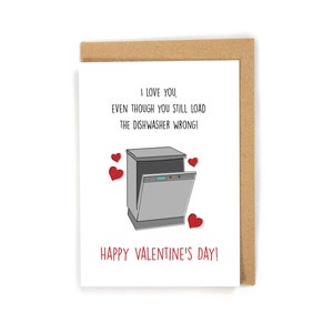 May include: A Valentine's Day card with a cartoon dishwasher and the text "I love you, even though you still load the dishwasher wrong! Happy Valentine's Day!"