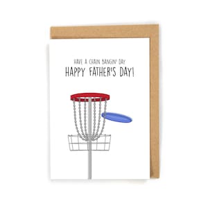 May include: A Father's Day card with a disc golf theme. The card features a cartoon illustration of a disc golf basket with a blue disc. The text reads, "Have a chain bangin' day! Happy Father's Day!" The card is in a kraft paper envelope.