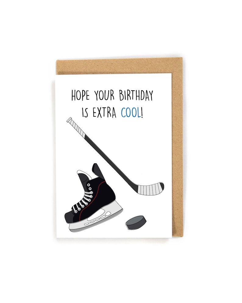 May include: A birthday card with a hockey stick, skate, and puck. The card reads "Hope your birthday is extra cool!"