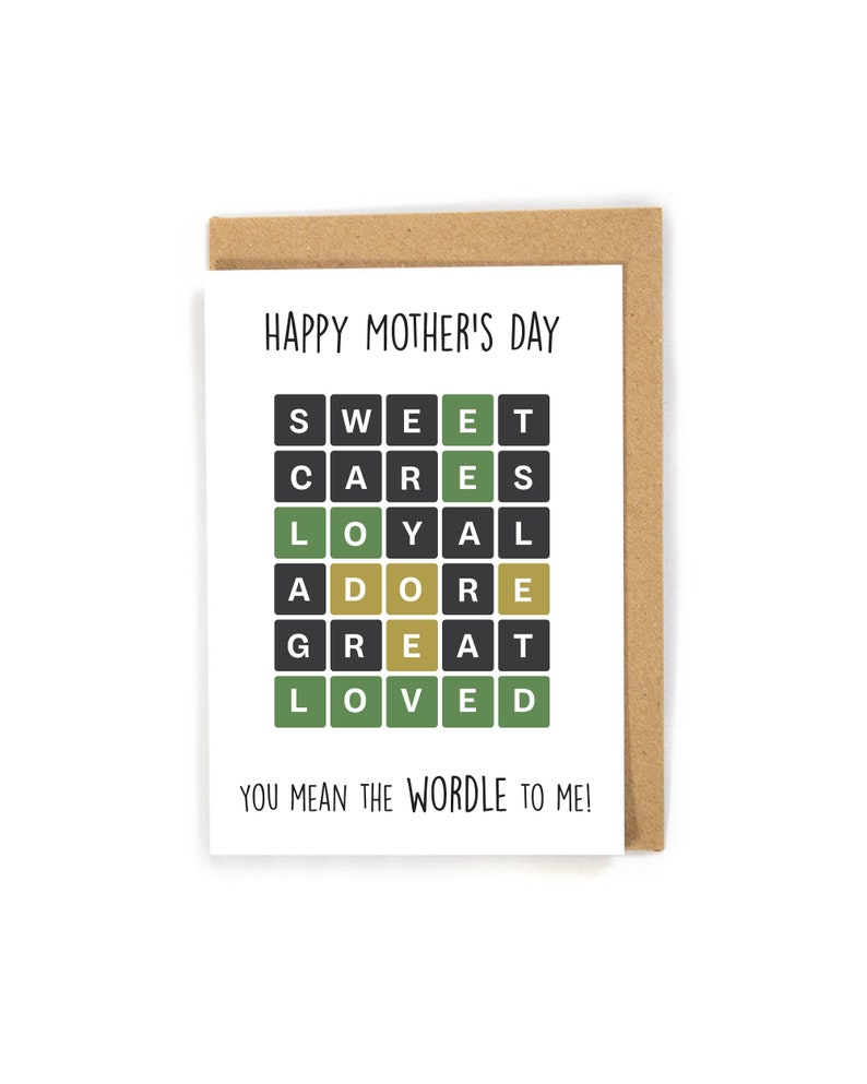 May include: A white card with black text that reads "Happy Mother's Day" and a wordle grid with the words "SWEET", "CARES", "LOYAL", "ADORE", "GREAT", and "LOVED". The text below the grid reads "You mean the WORDLE to me!"