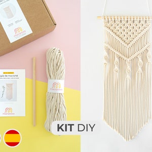 May include: A DIY macrame wall hanging kit with natural colored cotton cord, a wooden dowel, and instructions. The kit includes a finished example of the wall hanging.