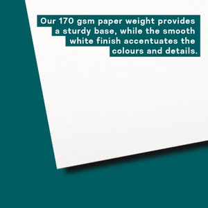 May include: A white piece of paper with the text "Our 170 gsm paper weight provides a sturdy base, while the smooth white finish accentuates the colours and details." printed on it.
