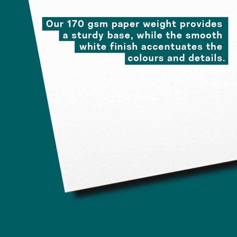 May include: A white piece of paper with the text "Our 170 gsm paper weight provides a sturdy base, while the smooth white finish accentuates the colours and details." printed on it.