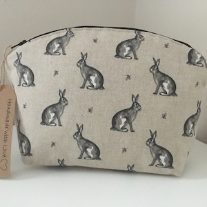 Handmade Linen Cosmetic Bag: Arched Toiletry Bag with Hare Print