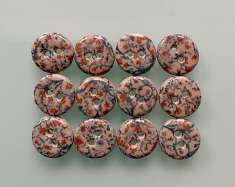 12 boutons « vrilles de fleurs » 16 mm