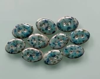 10 buttons oval turquoise with small flowers