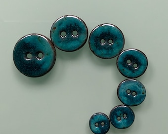 Buttons, ocean in various sizes