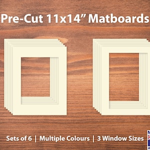 May include: A set of six pre-cut 11x14 inch matboards in a cream colour. The matboards are stacked and show the different window sizes available. The text "Sets of 6 | Multiple Colours | 3 Window Sizes" is at the bottom of the image.