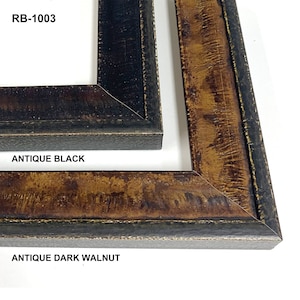 May include: Two picture frame samples in different colors. The top frame is labeled "RB-1003" and "Antique Black". The bottom frame is labeled "Antique Dark Walnut".