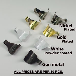 May include: Assortment of picture hanging hooks in various finishes, including nickel plated, gold plated, white powder coated, and gun metal.  ALL PRICES ARE PER 10 PCS.