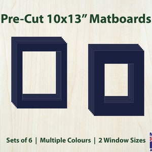 May include: A set of six 10x13 inch pre-cut matboards in navy blue. The matboards have two different window sizes. The text "Pre-Cut 10x13" Matboards" is at the top of the image. The text "Sets of 6 | Multiple Colours | 2 Window Sizes" is at the bottom of the image. The text "MADE IN AUSTRALIA" is in the bottom right corner of the image.