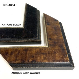 May include: Two picture frame samples, one in antique black and one in antique dark walnut. The frames are both wood with a distressed finish. The text "RB-1004" is at the top of the image.