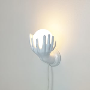 Ceramic wall lamp, hands with ball / globe, vintage 1980s sconce