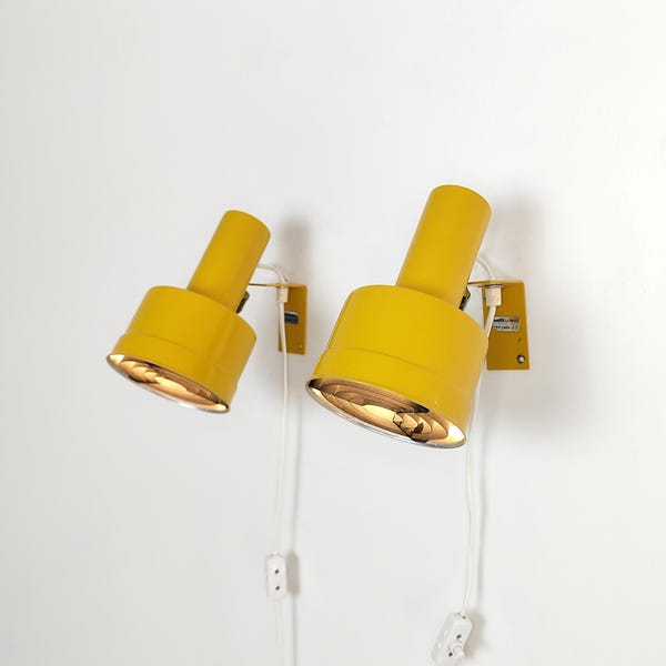 Reserved - Pair of yellow 1970s wall lamps, vintage industrial Swedish design
