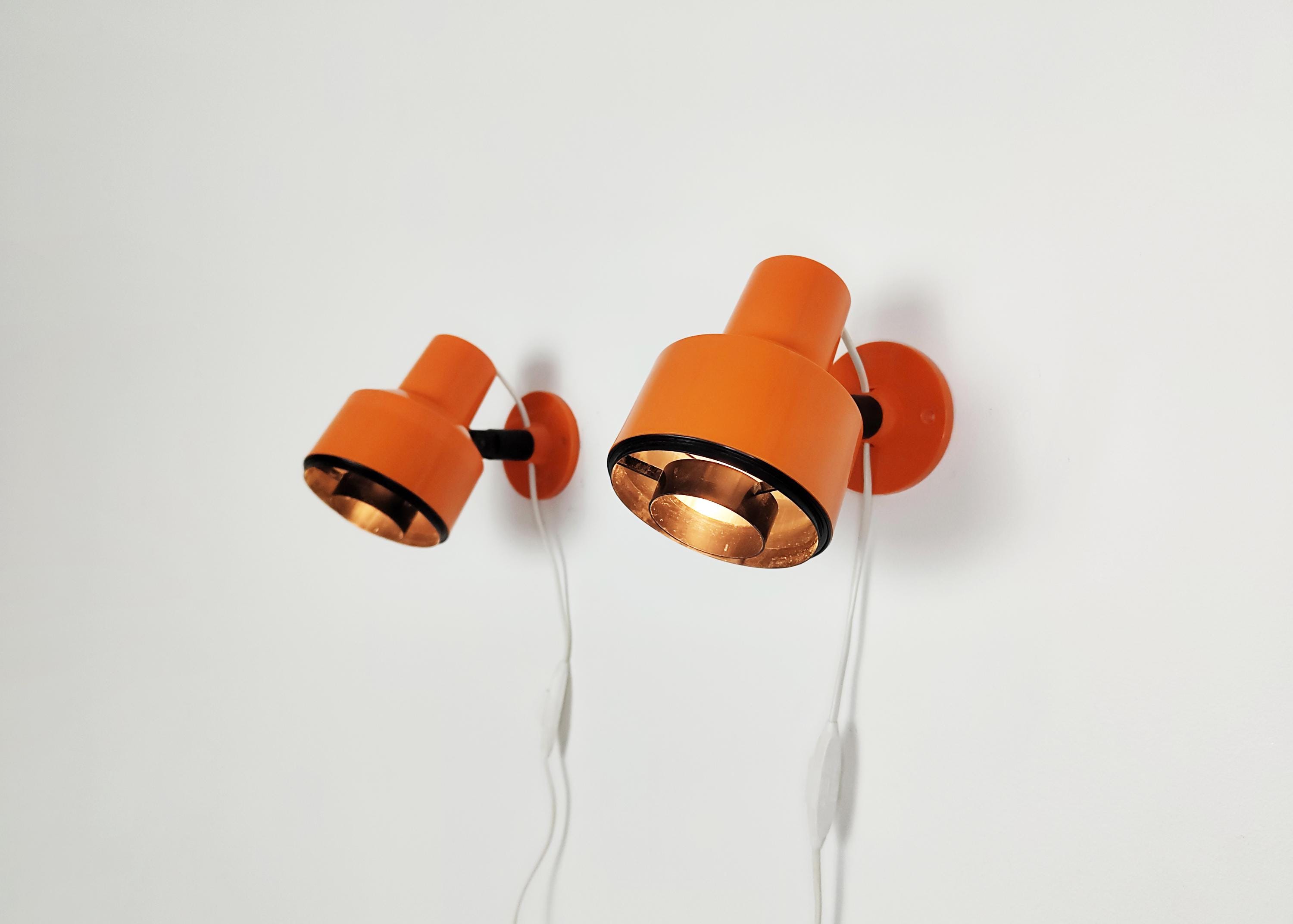 Pair of orange 1980s wall lamps / reading lamps, vintage Swedish design