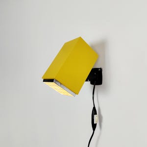 Elidus Kuben, 1970s wall lamp / sconce, vintage yellow Scandinavian space age design