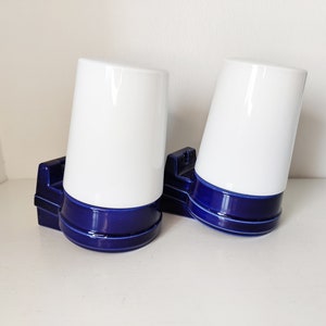 Pair of vintage Sigvard Bernadotte bathroom lamps, dark blue 1960s sconces, Swedish design