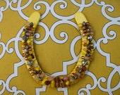 beaded horseshoe- yellow