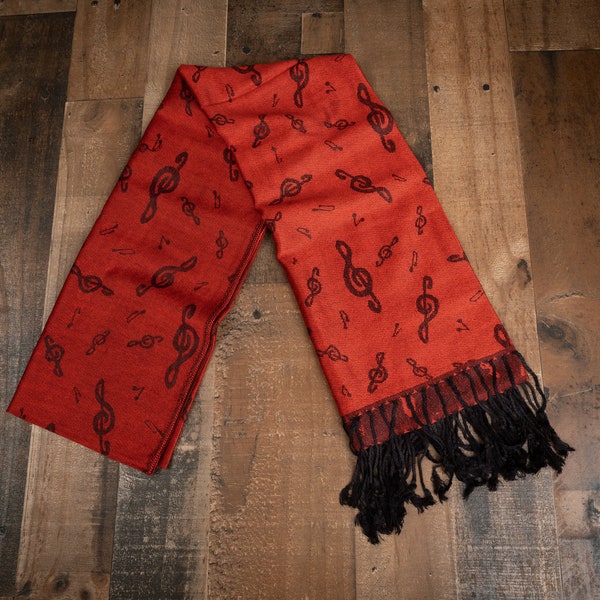 Pashmina Scarf with Black Treble Clefs and Music Notes in Bittersweet Orange