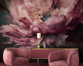 May include: Two plush pink armchairs with gold legs sit in front of a pink cabinet with gold legs. The chairs and cabinet are in front of a wall with a large pink floral painting.