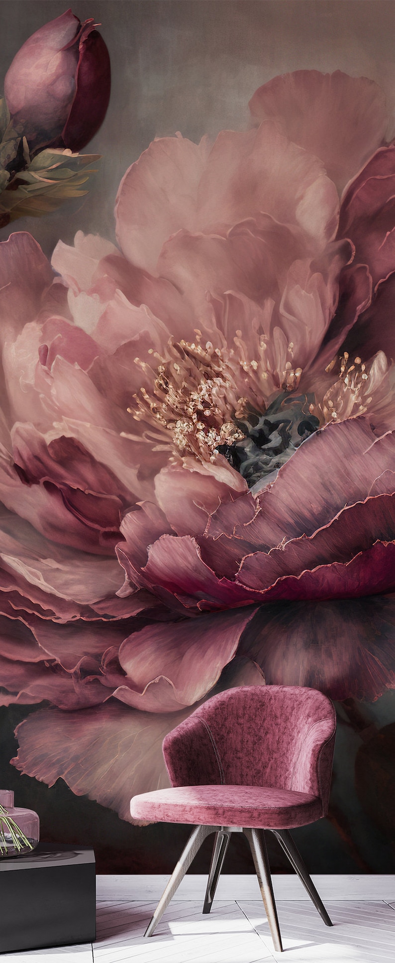 May include: A close-up of a large, pink flower with a velvet chair in the foreground. The flower has a deep pink centre and many layers of petals. The chair is a deep pink colour and has a rounded back and four legs.