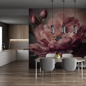 May include: A dining room with a floral wallpaper featuring a large pink peony. The wallpaper is behind a wooden table with four chairs. The table is set with a bowl of lemons.