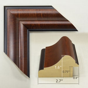 May include: A dark brown wood picture frame with a black inner edge. The frame is 1.6 inches wide, 2.7 inches tall, and 0.75 inches deep.