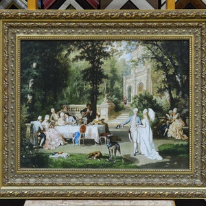 May include: A framed oil painting depicting a group of people gathered in a garden setting. The scene features a large group of people in 18th-century clothing, enjoying a meal outdoors. There are trees, a building, and a dog in the background.