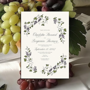 May include: A wedding invitation with a cream background, featuring a grape vine border with purple grapes and green leaves. The invitation includes the names "Charlotta Steward" and "Benjamin Thomson" and the date "September 18, 2027".