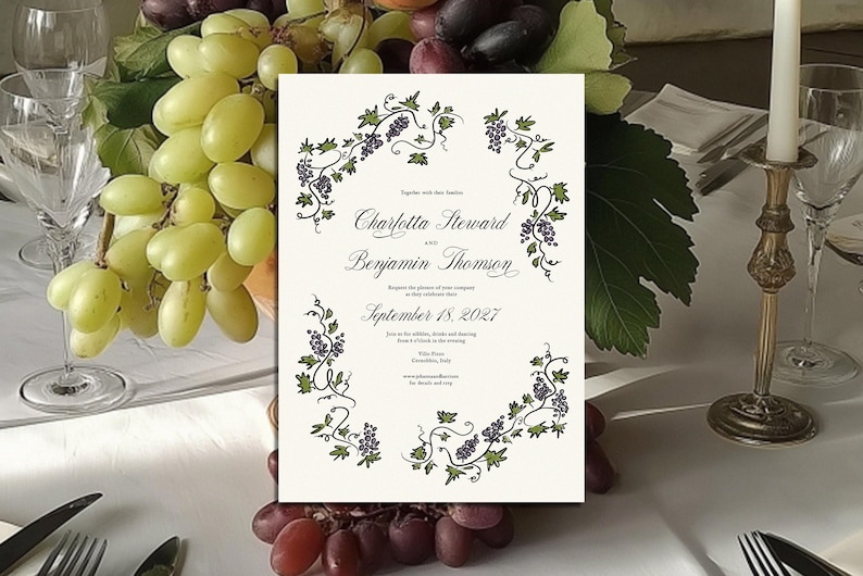 May include: A wedding invitation with a cream background, featuring a grape vine border with purple grapes and green leaves. The invitation includes the names "Charlotta Steward" and "Benjamin Thomson" and the date "September 18, 2027".