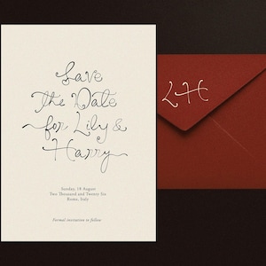 May include: A cream-colored invitation card with elegant calligraphy reading "Save The Date for Lily & Harry." A dark red envelope with the initials "LH" is next to the card. The text also includes the date, location, and a note about formal invitations.