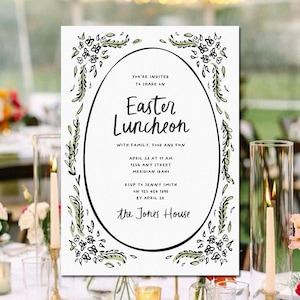 May include: A white invitation card with a black oval frame decorated with green leaves and flowers. The text reads "You're invited to share in an Easter Luncheon with family, friends and fun. April 15 at 11 am 1234 Any Street Meridian, Isar RSVP to Jenny Smith at 123 454 1290 by April 20 The Jones House"
