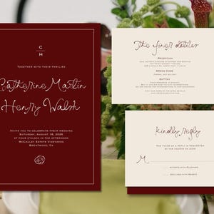 May include: Burgundy wedding invitation suite with a minimalist design. The main invitation features the names "Catherine Martin" and "Henry Walsh" in elegant script. Additional cards include details and RSVP information.