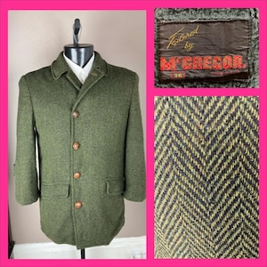 May include: A green herringbone tweed coat with a notched collar and three brown buttons. The coat has two front pockets and a label that reads "Tailored by McGREGOR". The coat is size 36.