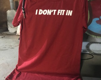 I DON"T FIT IN T-shirt from the book I Don't Fit In by Paul Collins published by HoZac books.