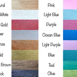 May include: A chart showing 14 different wood stain colors. The colors are: Natural, Pearl White, Rose Gold, Silver, Bronze, Gold, Stained Brown, Black, Pink, Light Blue, Purple, Ocean Blue, Light Purple, Blue, Teal, and Olive.